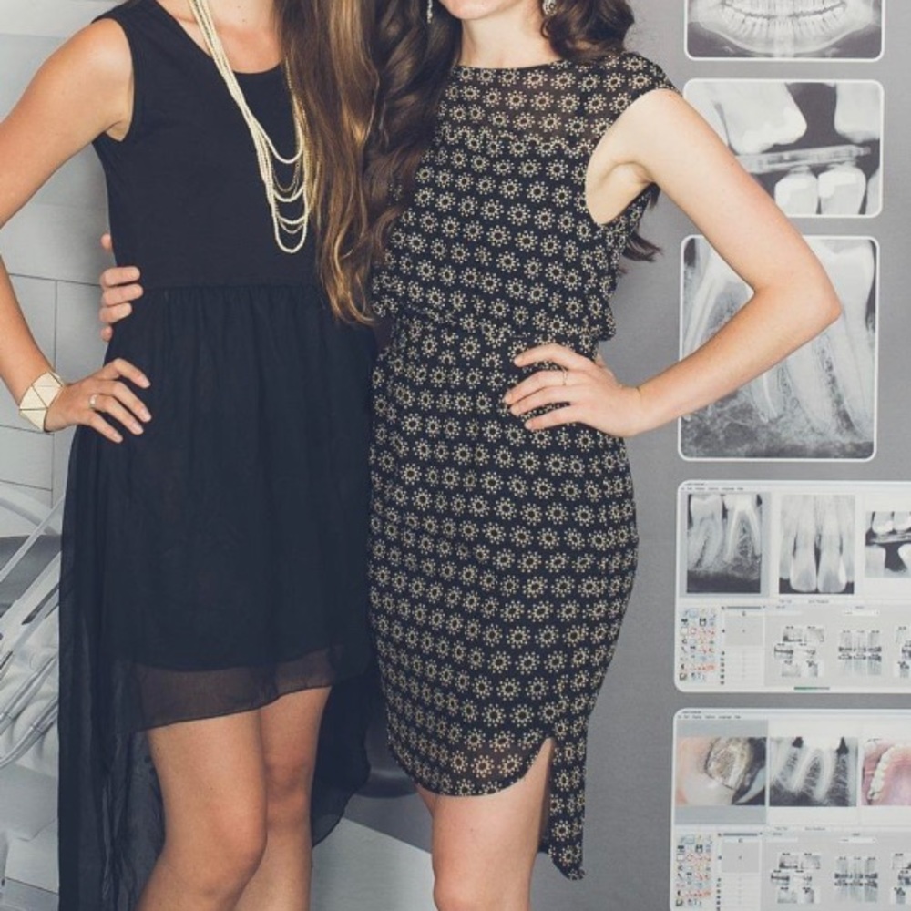 Angeleye London | little black dress with tan details and high low hemline